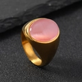 Elegant gold-tone stainless steel ring featuring a pink oval gemstone on dark slate stone - 6 / Oval Pink Gemstone / Gold