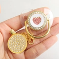 Golden baby pacifier set with sparkling pink crystal heart and matching luxury clip - Transparent Gold Heart