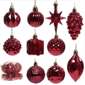 Assorted red metallic Christmas ornaments set including stars and pinecones in a clear box - Burgundy