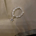 Elegante anillo de perlas barrocas con un colgante de estrella dorada y piedra brillante - Anillo de Perlas de Agua Dulce Con Dije de Estrella