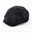 Detail of black corduroy newsboy cap showing plaid texture and top button finish - M (56-58cm) / Black and Gray