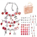 Flat lay of DIY ocean theme charm bracelet kit with silver and pink beads in a gift bag - Red Series