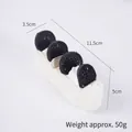 Artificial cream cake squishy toy with chocolate cookies and coconut texture, 11.5cm long - PU Biscuit Cake
