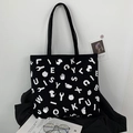 Bolso tote grande de lona negra con estampado de graffiti blanco para mujer - Graffiti de Huella Negra (Patrón de Doble Cara)