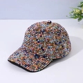 Close-up of vibrant multicolored rhinestones on a high-quality sparkling baseball cap - Adjustable / Rainbow