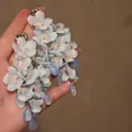 Detailed shot of large light blue floral drop earrings with soft fabric petals - 925 Sterling Silver Earring Post Blue Flower (25#)