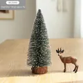 Mini 25cm snow-flocked Christmas tree with a natural wooden base for table decoration - 25CM Flocked Christmas Tree