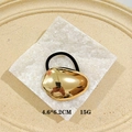 Punk style geometric hair tie with irregular gold mirror metal piece and black elastic - Egg Shape