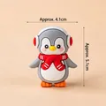 Cute penguin figurine with red scarf for Christmas decor, size 4.1cm by 5.1cm - Soft Glue Little Penguin