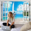 Detail of 3D ocean view tapestry featuring beach scene and palm trees in a bedroom setting - 150x130cm / 3D Faux Window Tropical Ocean