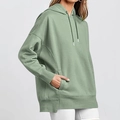 Detail of a Morandi green oversized hoodie featuring a kangaroo pocket and ribbed cuffs - S / Yellow-Green