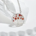 Silver tree of life necklace featuring vibrant red zircon stones and a sparkling pave border - Red