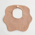 Detail of petal-shaped muslin baby bib in light brown soft cotton with snap closure - Light Coffee