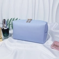 Lavender faux leather makeup bag with cross-grain texture and golden double zippers - Medium / Light Purple