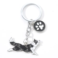 Dettaglio portachiavi in metallo Border Collie con piccolo ciondolo a forma di zampa - 10cm 15g / Border Collie con Impronta di Zampa (M10188)