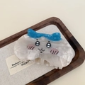 Cute white acetate cat hair claw clip with blue bow detail on wooden tray backdrop - Blue Bow Cat Hair Claw