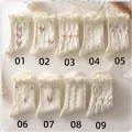 Set of 9 cream white knit crew socks with pink bows and elegant lace ruffle cuffs - Style 01 / Bow