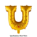 Golden horseshoe foil balloon with red polka dots for St. Patrick's Day decor, 49x59cm - Gold U-shaped Horseshoe / 49x59cm