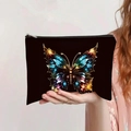Handheld view of black canvas pouch featuring vibrant artistic 3D butterfly graphics - 3D Texture Colorful Art Butterfly (jiayingpbb0336)