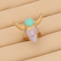Macro shot of Bohemian gold bull head ring with green beads and purple accents - Gold Green Purple Beaded Bull Head (6#)