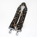 Close-up of leopard jacquard strap with gunmetal lobster claw clasps and adjustable buckle - Grey With Gunmetal Buckle
