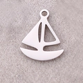 Polished silver stainless steel sailboat pendant with hanging ring on textured fabric - Sailboat / Steel