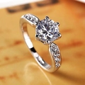 Silver six-prong solitaire ring with a round moissanite and side diamond accents - JZ042 (2 Carats White Gold Color)