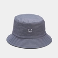 Detailed view of the white smile embroidery on a dark grey cotton bucket hat fabric - S Kids 52-54cm (2-8 Years) / Fog Blue/Black Reversible