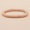 Minimalistische bohemien stretch armband met licht perzikkleurige heishi kralen afwerking - Lichtroze