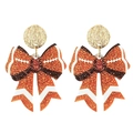 Close-up of glitter football bow earrings with orange and brown sequin details - Style 3-Gold Stud Orange Brown Glitter Bow Dangle