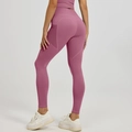 Hoge taille yoga leggings in oudroze met mesh zakken en een push-up effect - S / Oudroze