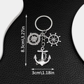 Silver nautical keychain with anchor compass and helm charms on black leather background - Compass Anchor Rudder (ER676)