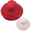 Detail of red and beige wide brim cotton sun hats showing texture and UV protection - Red