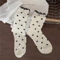 Sweet cream mid-calf socks featuring black heart patterns and delicate lace trim ruffles - One Size / White