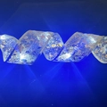 LED Christmas ribbon lights with gold star patterns and blue glowing mesh effect - Gold Foil Ribbon (cool Lighting) / 2 Meters
