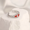 Detailed close-up of a silver chain ring with a red devil eye on a stone base - Adjustable Open / Steel Color Evil Eye Red