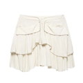Chic cream layered ruffle mini skirt with delicate silver bead trim on high-quality fabric - XS / Apricot