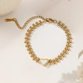 Detail of 18K gold-plated titanium steel bracelet with leaf chain and heart pendant - Gold