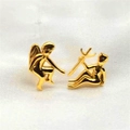Polished gold angel and devil stud earrings set displayed on white silk fabric background - Full S925 Sterling Silver / Gold