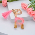 Pink resin letter R keychain with gold foil flakes and matching pink fringe tassel - Letter R