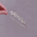 Golden metal headband with sparkling zircon leaf patterns and a polished finish - Hollow Leaf