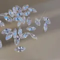 Macro view of marquise-cut zirconia stones with high clarity and colorful fire - Transparent White Marquise / 3.5*7mm