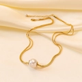 Elegant gold snake chain necklace featuring a single Baroque pearl pendant on silk fabric - [H47] Large Pearl Gold