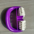 Handheld roller massager featuring a purple D-shaped handle and white spiked rollers - 1023-1 Point Wheel Massager Rose Purple