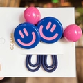 Close-up of blue smiley face charms and pink beads on high-elasticity hair ties - 2 Pcs/Set / Dark Blue