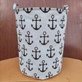 Cylindrical fabric laundry basket with black anchor prints and durable handles - Anchor