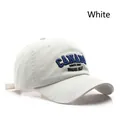 White washed cotton baseball cap with blue Canada embroidery and curved brim for outdoor - White