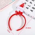 Christmas headband featuring a small snowman icon and red bow with snowflake prints - Red Snowman Style