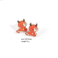 Detailed view of red wooden devil earrings with pitchfork measuring 20x16mm - Red Devil