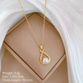 Macro detail of gold necklace with pearl and diamond pendant showing size parameters - Necklace-C141 (Titanium Steel Chain Copper Pendant)